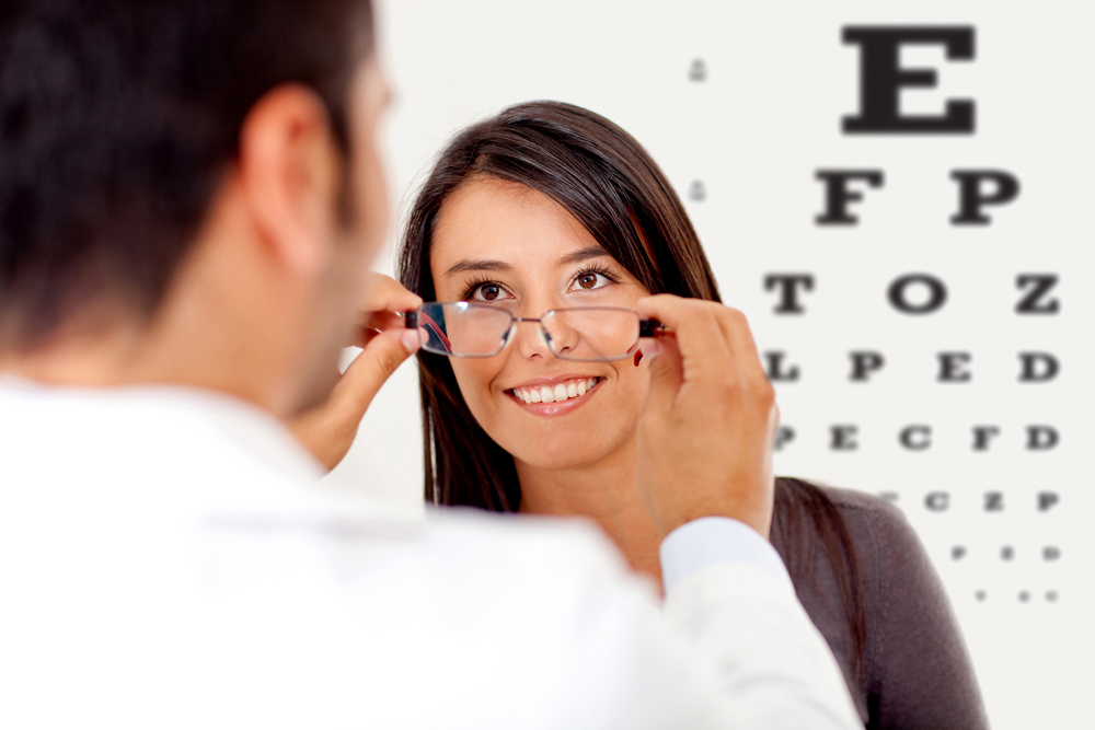 Optometrists with patient